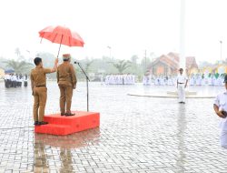 Diguyur Hujan Lebat, Upacara HKN Tetap Khidmat di Aceh Utara